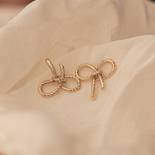Gold Bow Shaped Earrings with Rope Texture