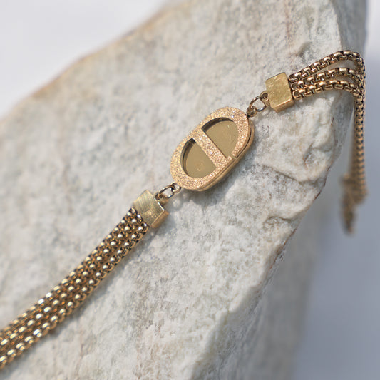 Vintage Christian Dior bracelet costume jewelry with logo